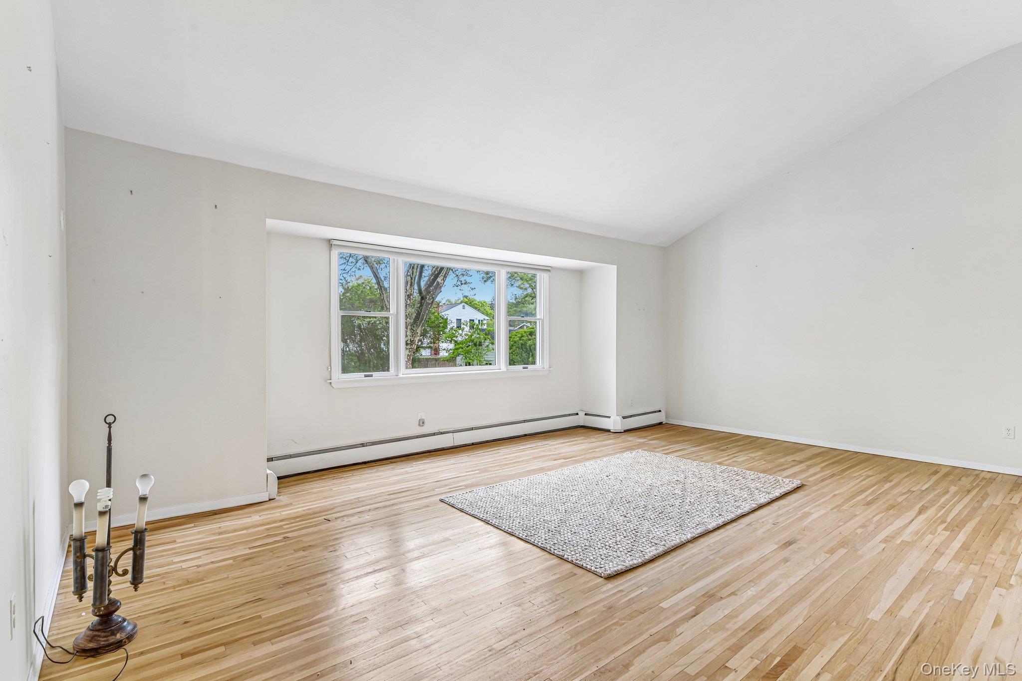 237 Cedar Road East Northport, NY 11731 - Photo 21 of 45 Vaulted ceilings, neutral decor.