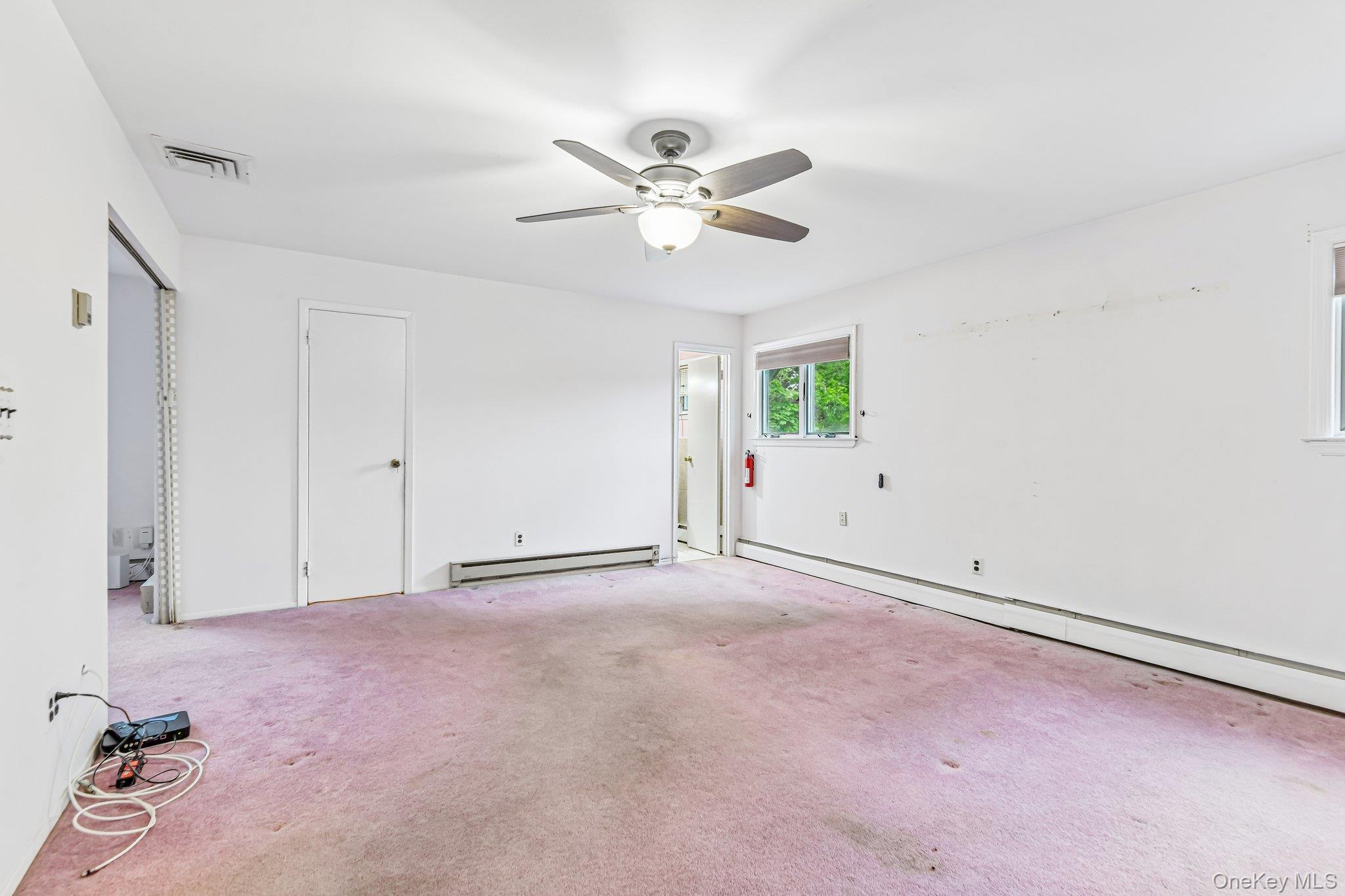 237 Cedar Road East Northport, NY 11731 - Photo 22 of 45 Hardwood floors under all br carpets. Ceiling fan and 3 closets.