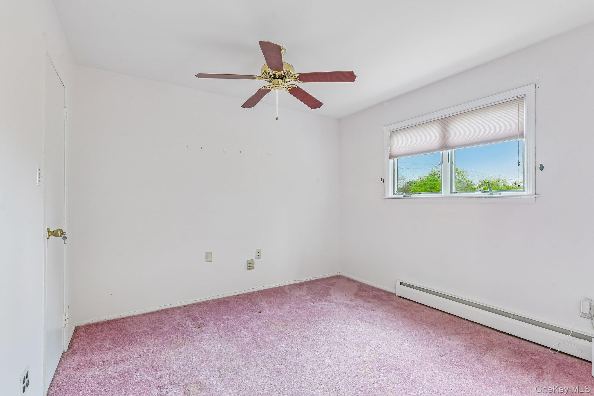 237 Cedar Road East Northport, NY 11731 - Photo 24 of 45 Sitting room in primary or can be closed off for 5th bedroom or nursery.