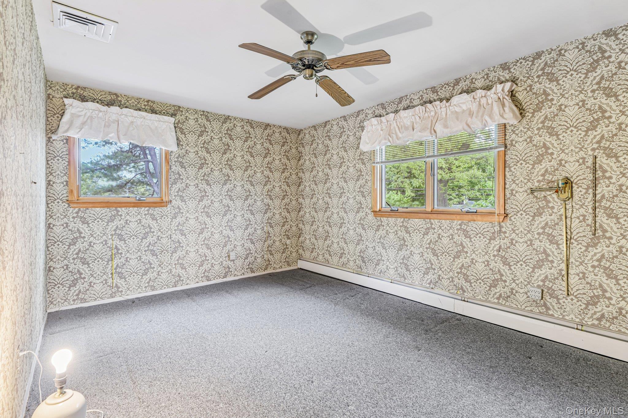 237 Cedar Road East Northport, NY 11731 - Photo 30 of 45 Hardwood floors under carpeting.