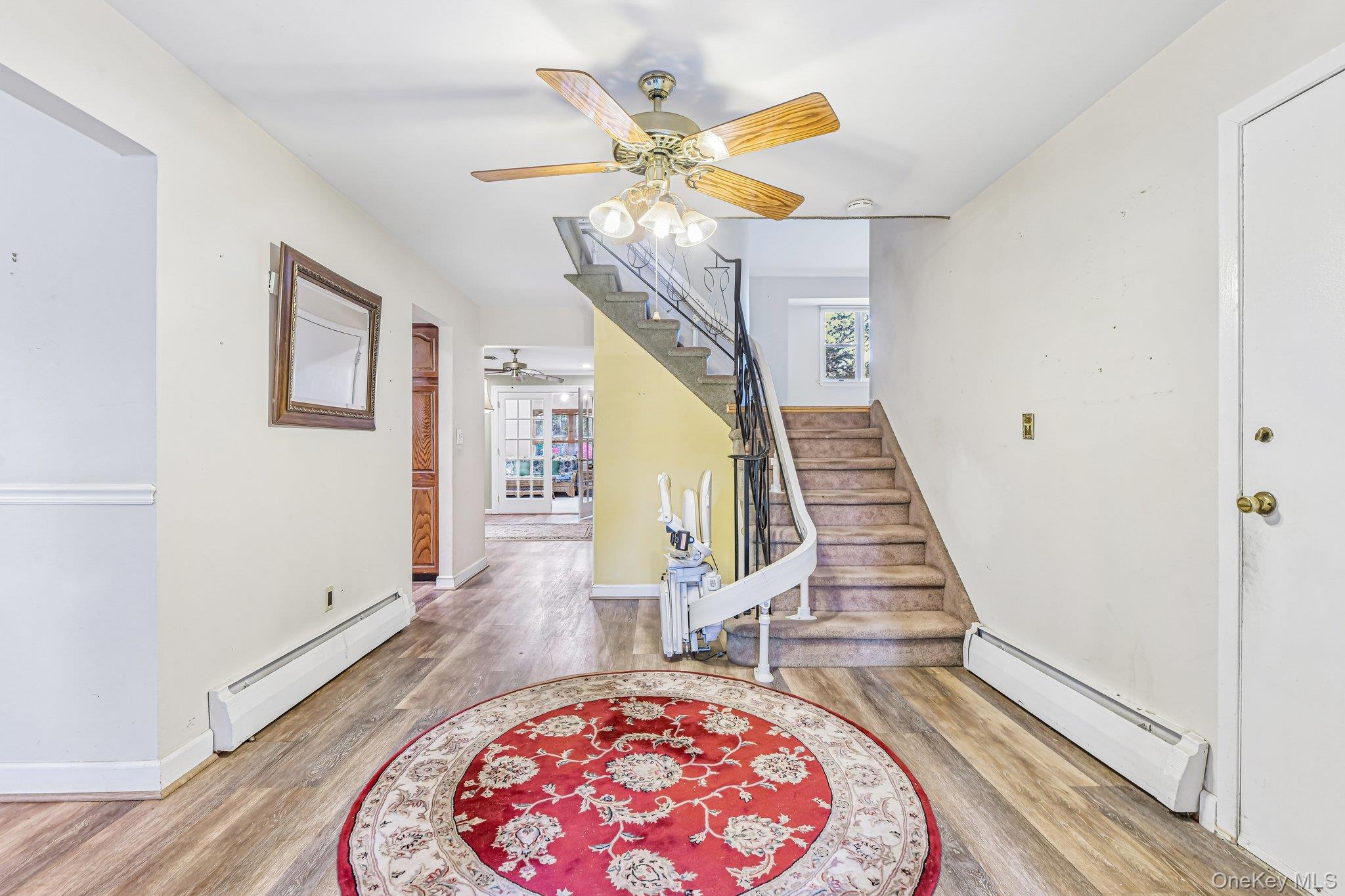 237 Cedar Road East Northport, NY 11731 - Photo 6 of 45 Stately entry foyer with convenient entry to garage.