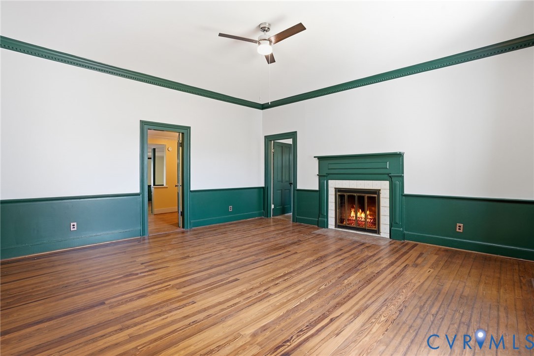 2297 Indian Oak Road Crewe, VA 23930 - Photo 12 of 53 a view of empty room with wooden floor and fan