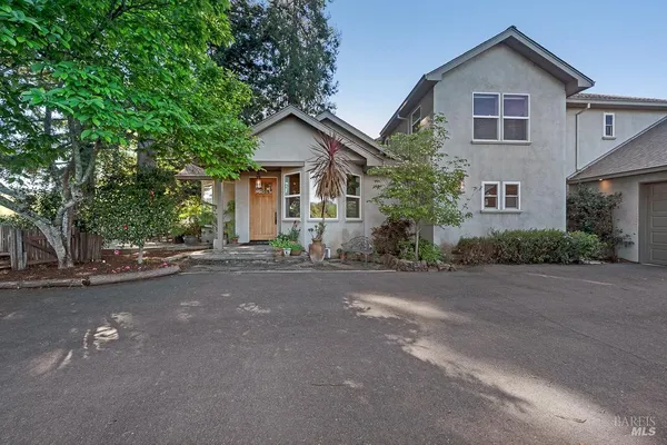 front view of a house with a street