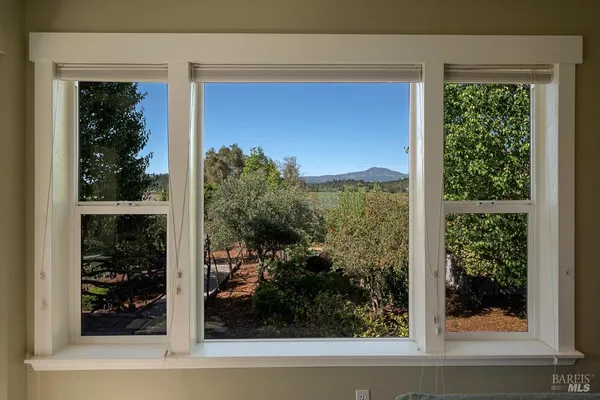 a view of a window and a living room