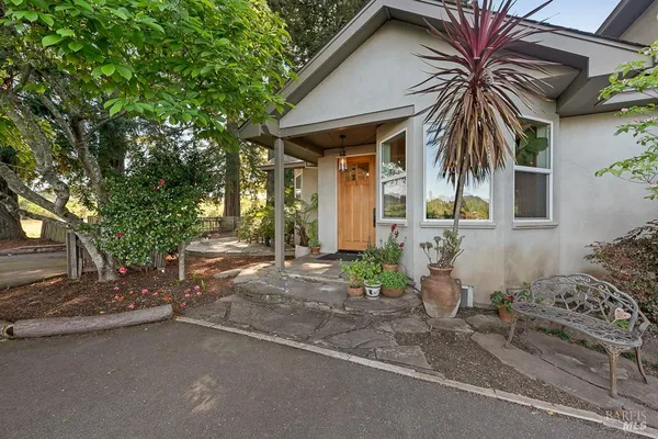 a view of a house with a patio
