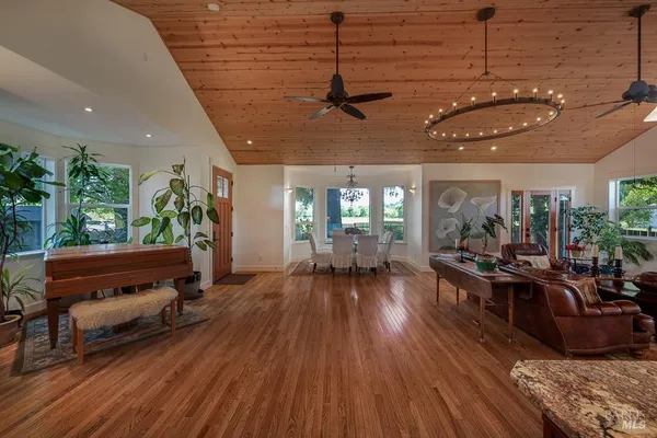 a view of a living room and dining room