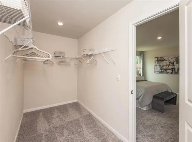 a utility room with sink dryer and washer