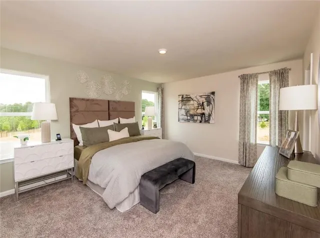 a work room with furniture and a wooden floor