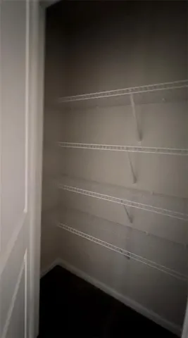 a view of a room with an empty space