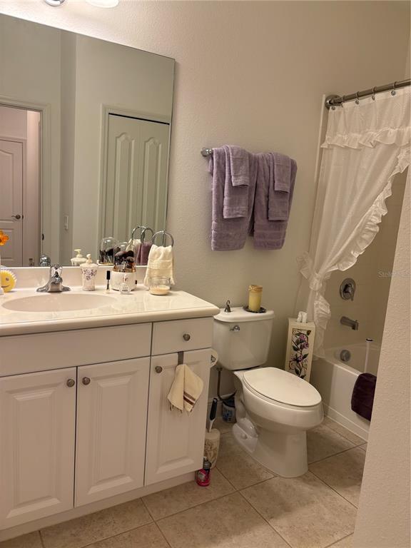 10923 Blue Magnolia Lane Parrish, FL 34219 - Photo 16 of 31 a bathroom with a sink toilet and shower