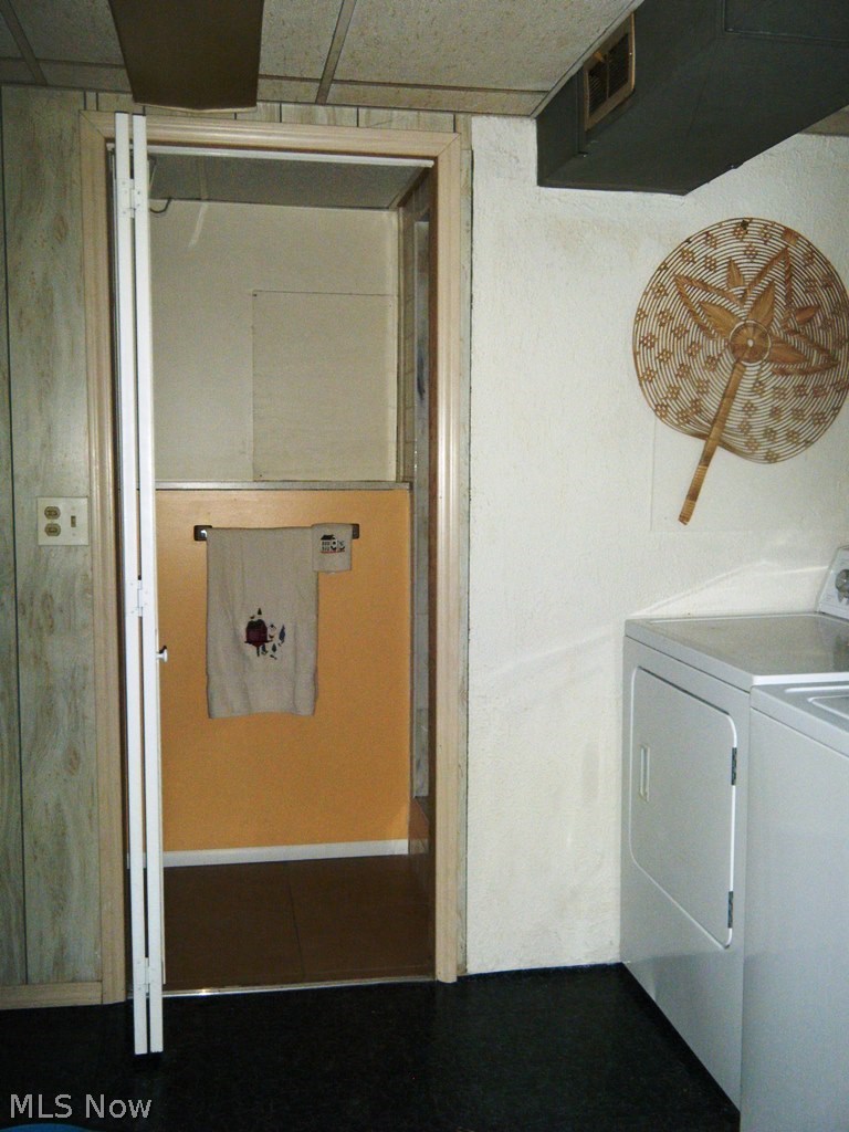 567 Button Road Bedford, OH 44146 - Photo 12 of 22 Half bathroom with shower