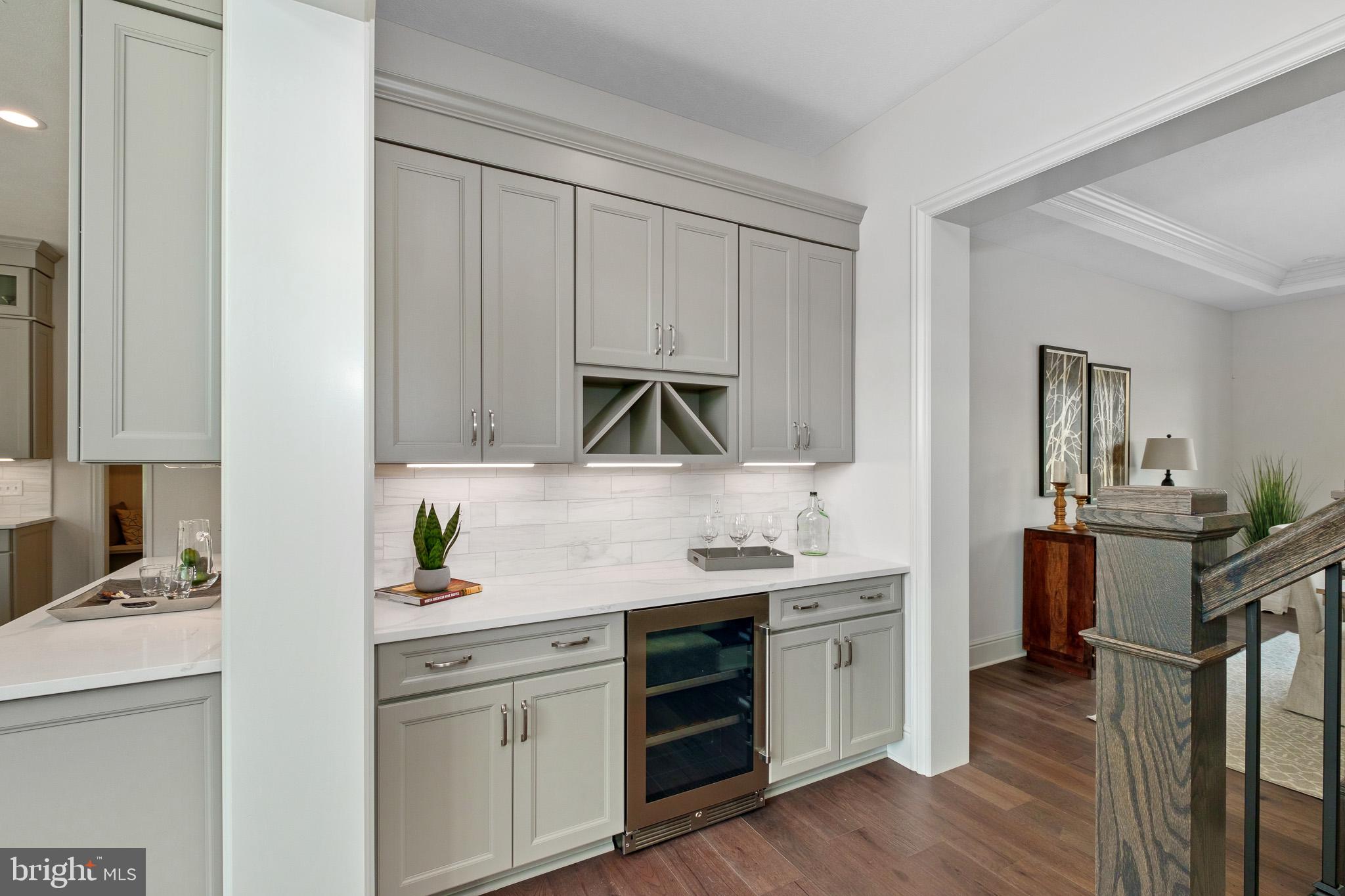 510 Newcomen Road, Unit R1D Exton, PA 19341 - Photo 16 of 51 a kitchen with a sink cabinets and wooden floor