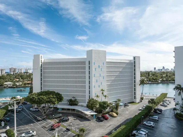 a backyard of a house with outdoor seating