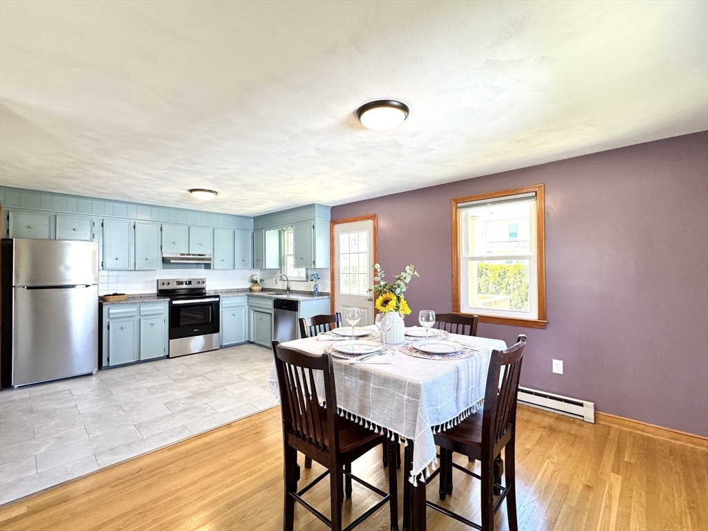 14 Maxdale Road Worcester, MA 01602 - Photo 11 of 42 a view of a dining room with furniture and a window