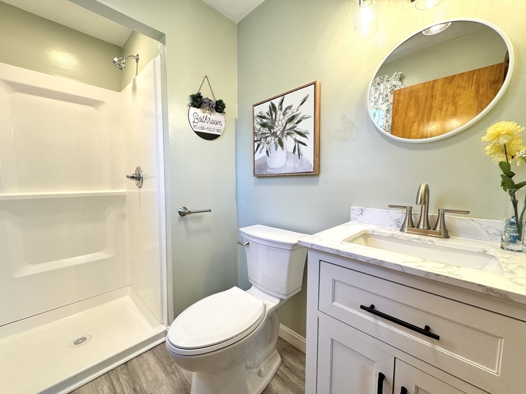 14 Maxdale Road Worcester, MA 01602 - Photo 21 of 42 a bathroom with a toilet and a sink