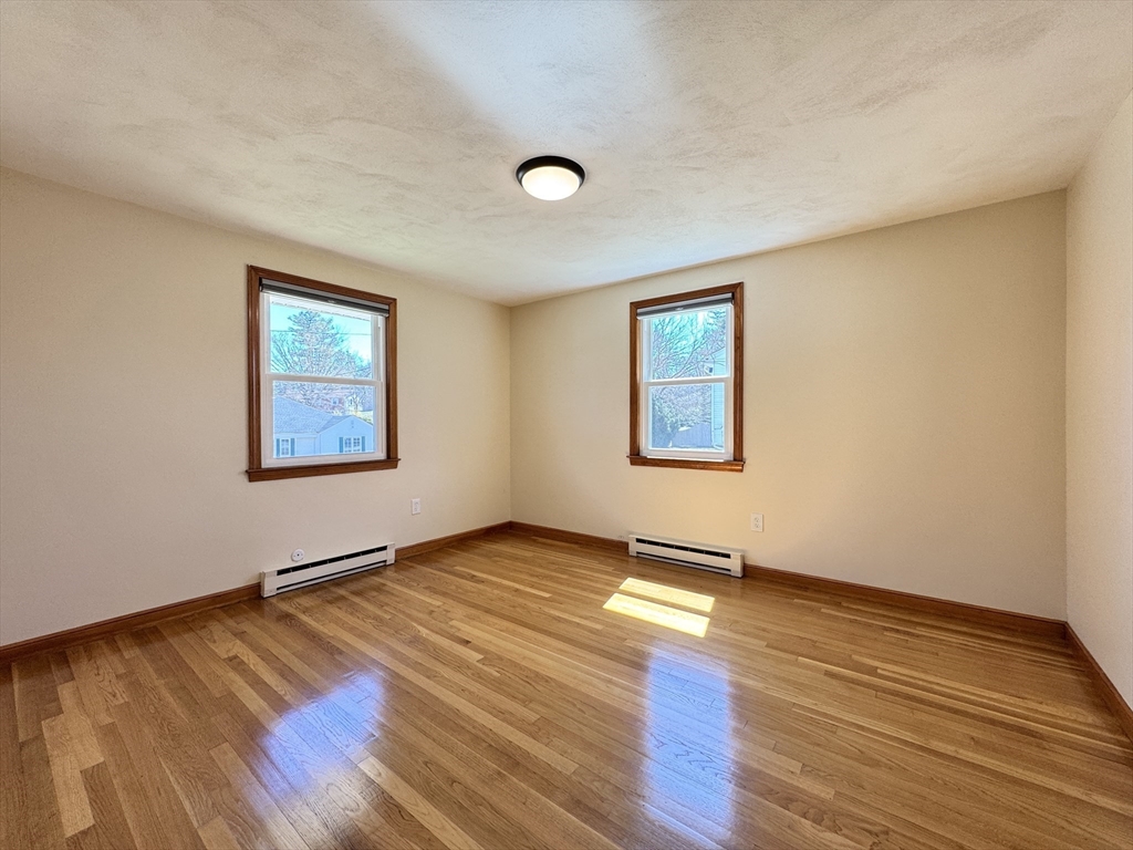14 Maxdale Road Worcester, MA 01602 - Photo 22 of 42 a view of a room with wooden floor and white walls