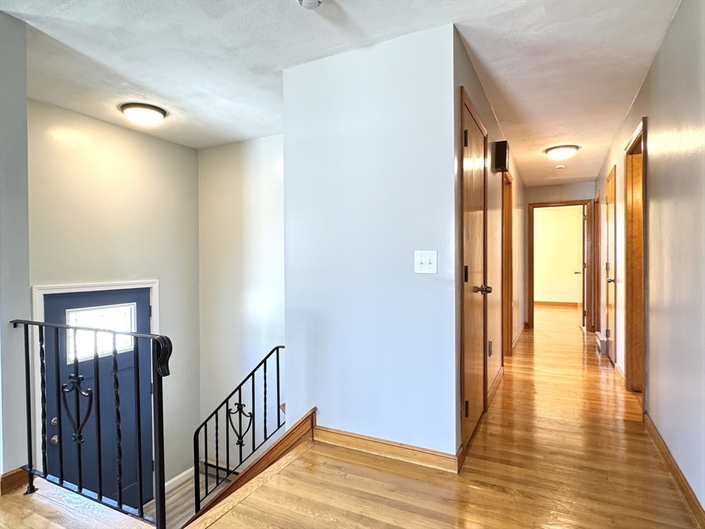 14 Maxdale Road Worcester, MA 01602 - Photo 25 of 42 a view of a hallway with wooden floor