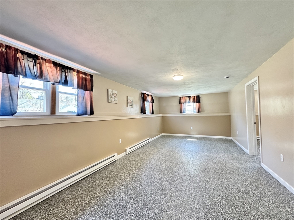 14 Maxdale Road Worcester, MA 01602 - Photo 32 of 42 a view of an empty room with a window