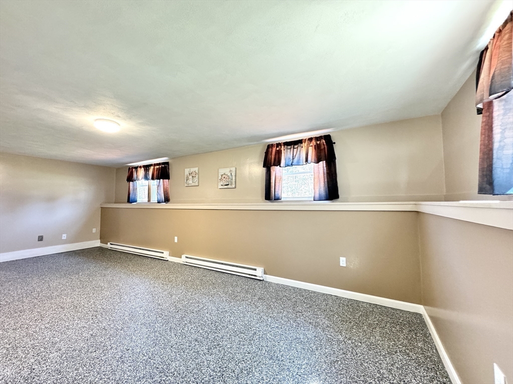 14 Maxdale Road Worcester, MA 01602 - Photo 35 of 42 an empty room with windows