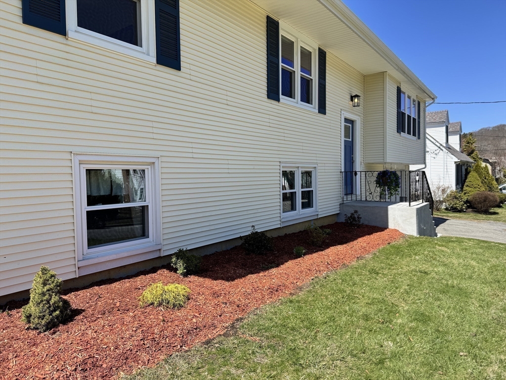 14 Maxdale Road Worcester, MA 01602 - Photo 39 of 42 a front view of a house with a yard