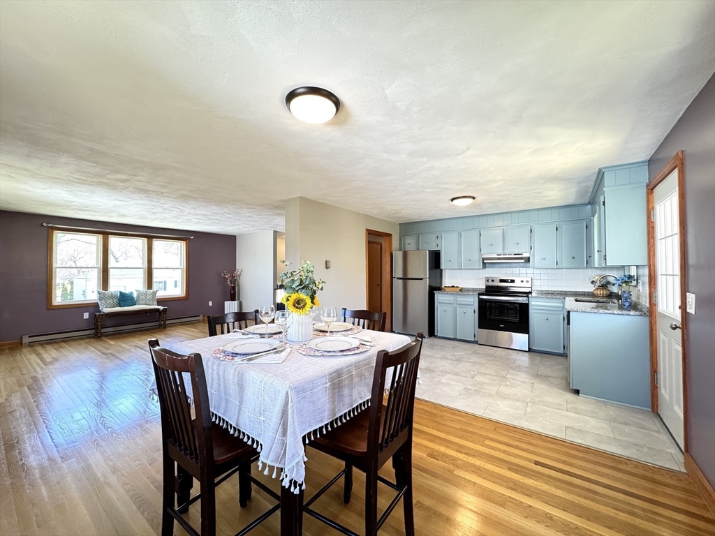 14 Maxdale Road Worcester, MA 01602 - Photo 6 of 42 a view of a dining room with furniture and wooden floor