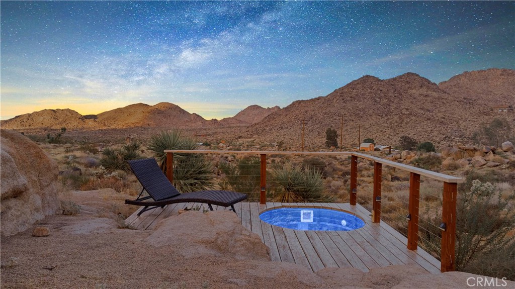 62238 Rincon Road Joshua Tree, CA 92252 - Photo 14 of 60 a view of a terrace with a yard
