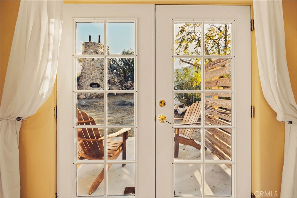 62238 Rincon Road Joshua Tree, CA 92252 - Photo 19 of 60 walk in closet with window and glass door