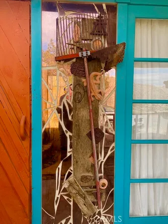 a bathroom with a toilet sink and a mirror