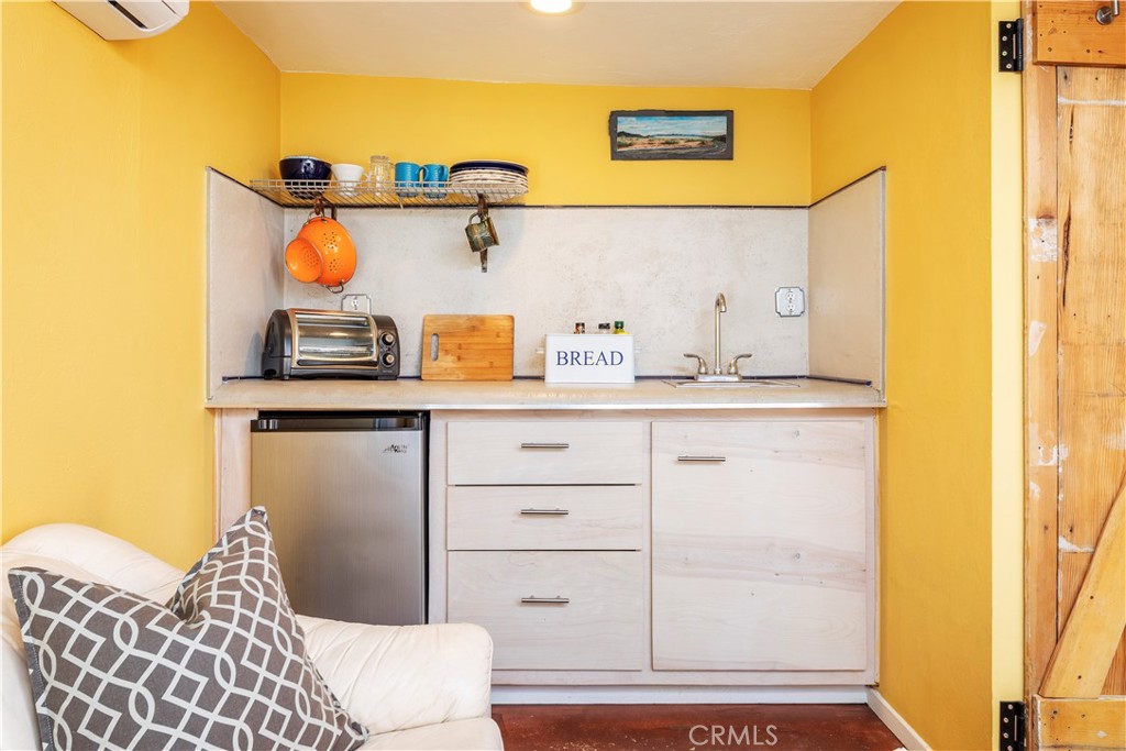 62238 Rincon Road Joshua Tree, CA 92252 - Photo 23 of 60 a bathroom with a sink and a mirror