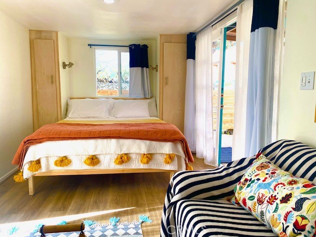 62238 Rincon Road Joshua Tree, CA 92252 - Photo 25 of 60 a bedroom with a bed and a window