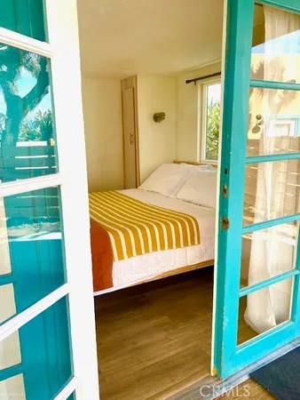 a view of a porch with a floor to ceiling window