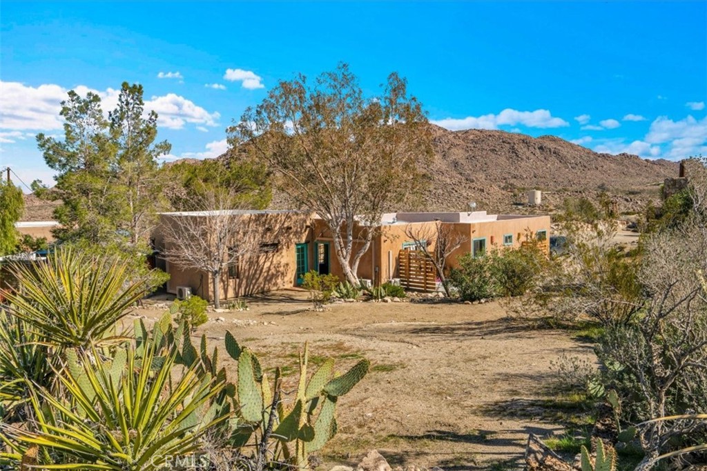 62238 Rincon Road Joshua Tree, CA 92252 - Photo 60 of 60 a view of a yard with an outdoor space