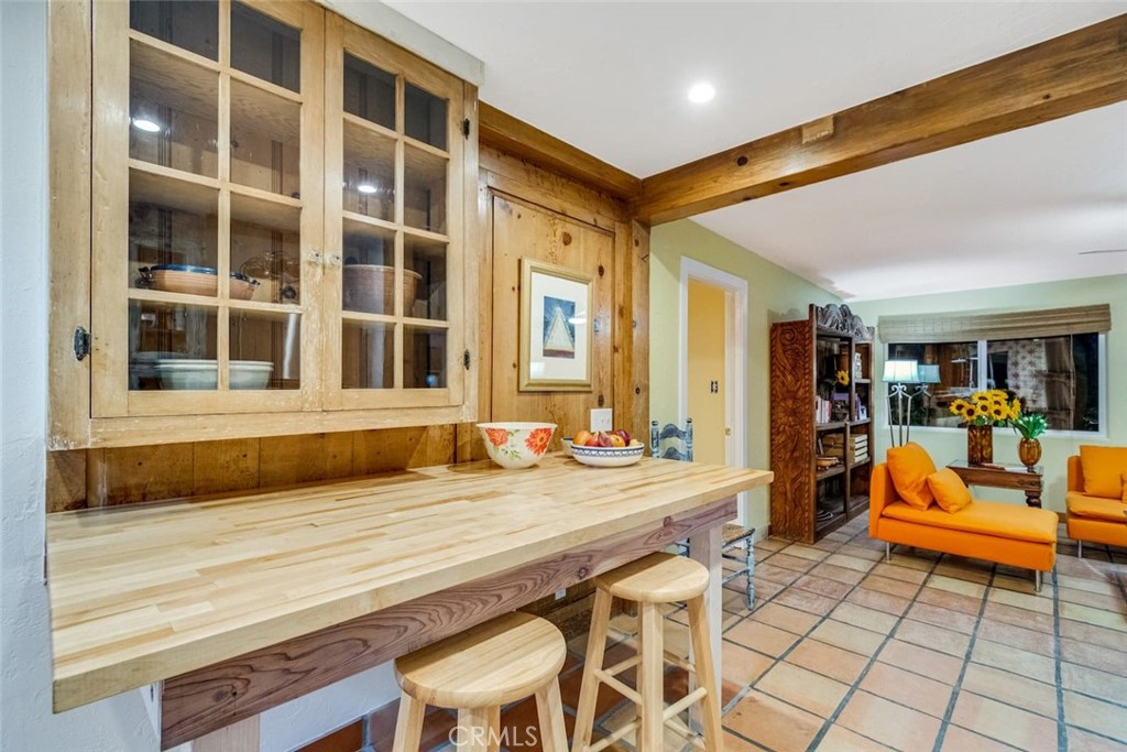 62238 Rincon Road Joshua Tree, CA 92252 - Photo 8 of 60 a living room with a large window and table