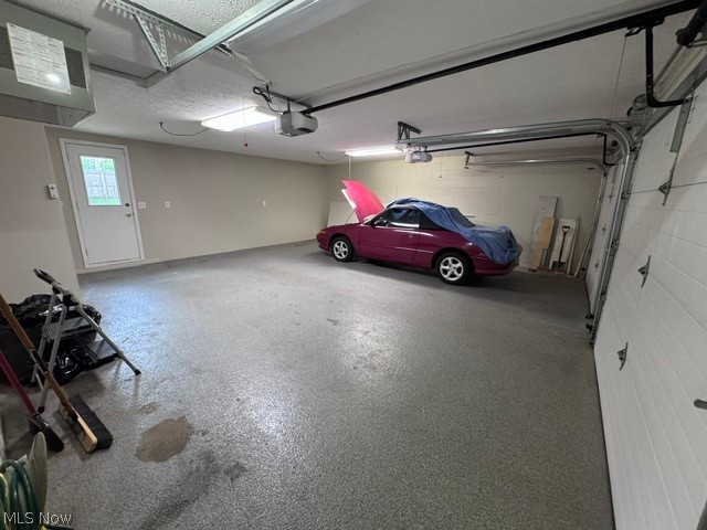 305 Guy's Run Road, Unit 305 Akron, OH 44319 - Photo 36 of 37 large garage with nature stone flooring and heating unit
