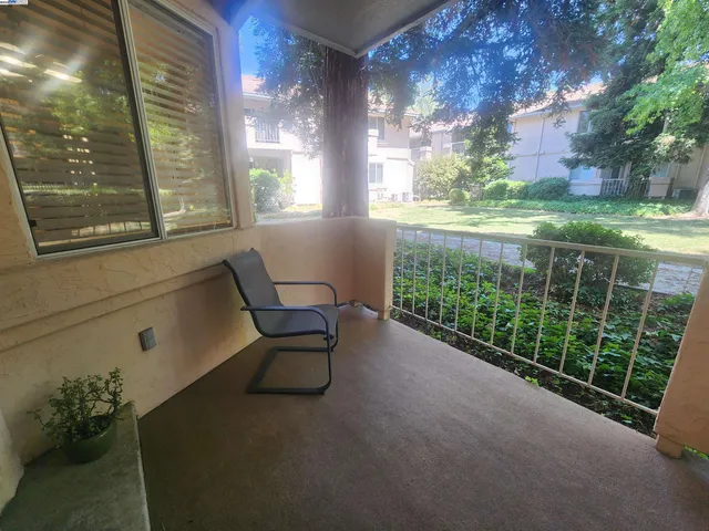 a view of a two chair in the city room