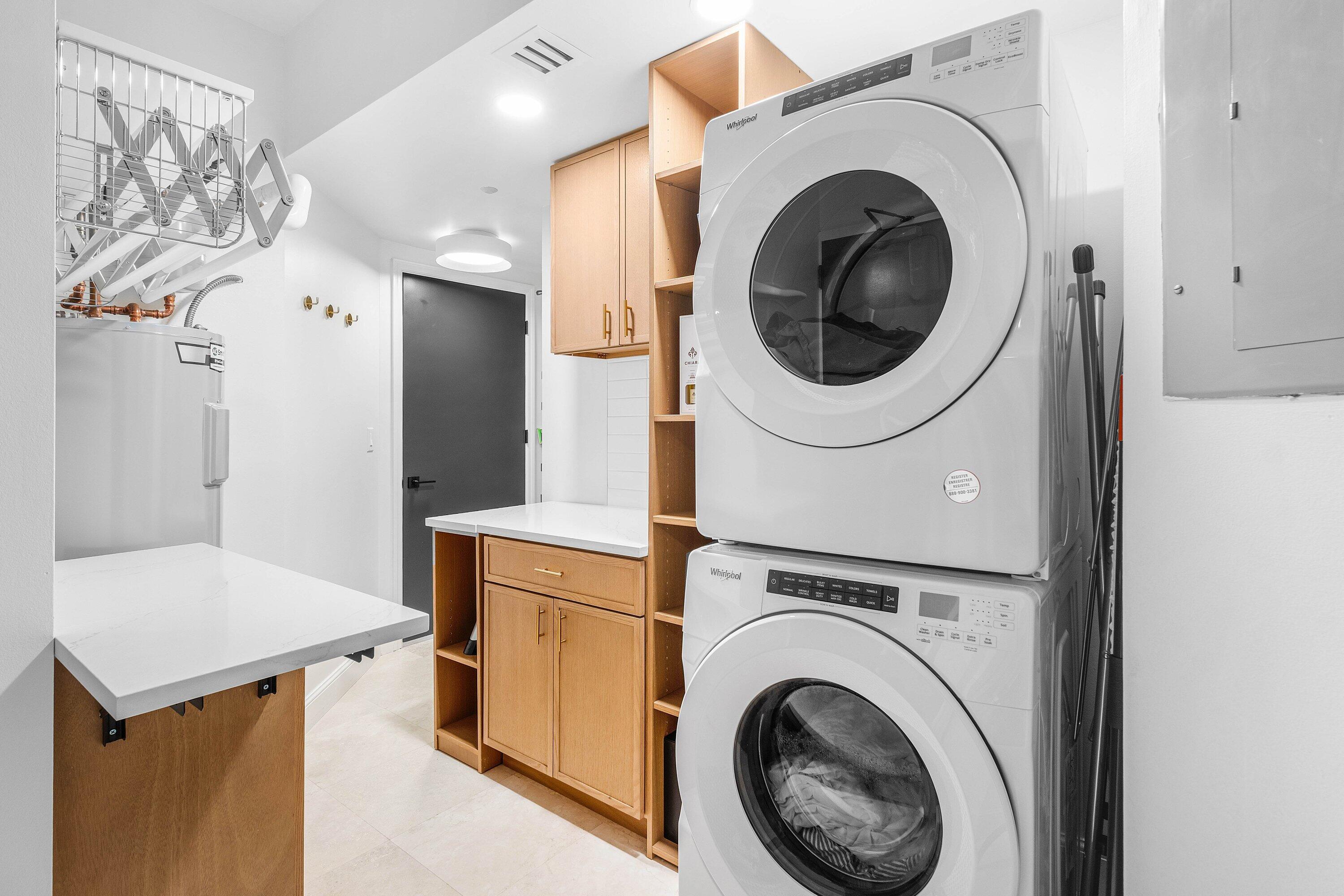 3700 South Ocean Boulevard, Unit 202 Highland Beach, FL 33487 - Photo 12 of 75 a utility room with dryer and washer