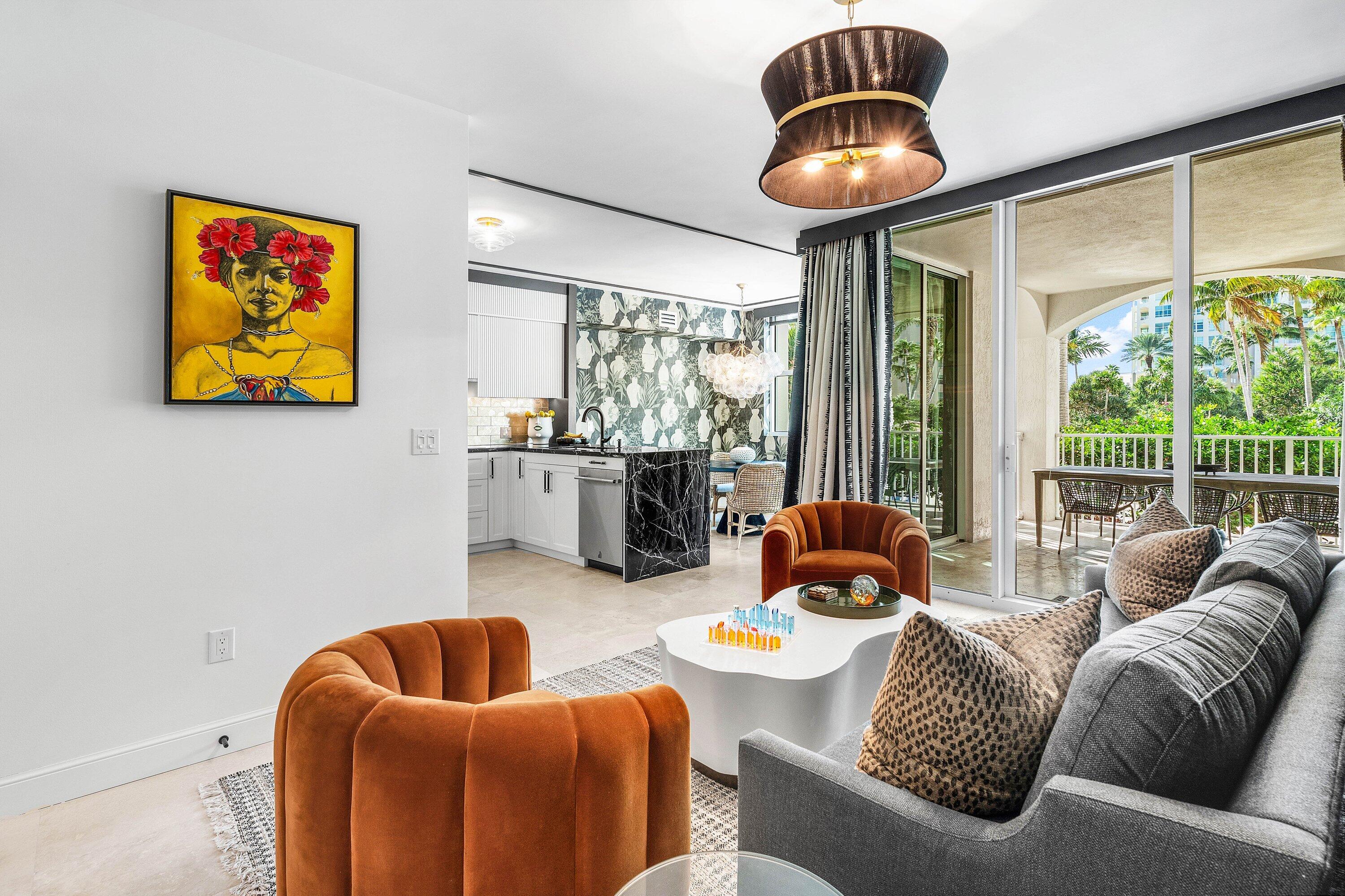 3700 South Ocean Boulevard, Unit 202 Highland Beach, FL 33487 - Photo 17 of 75 a living room with furniture and a large window