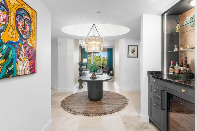 a bathroom with a sink a mirror and a shower