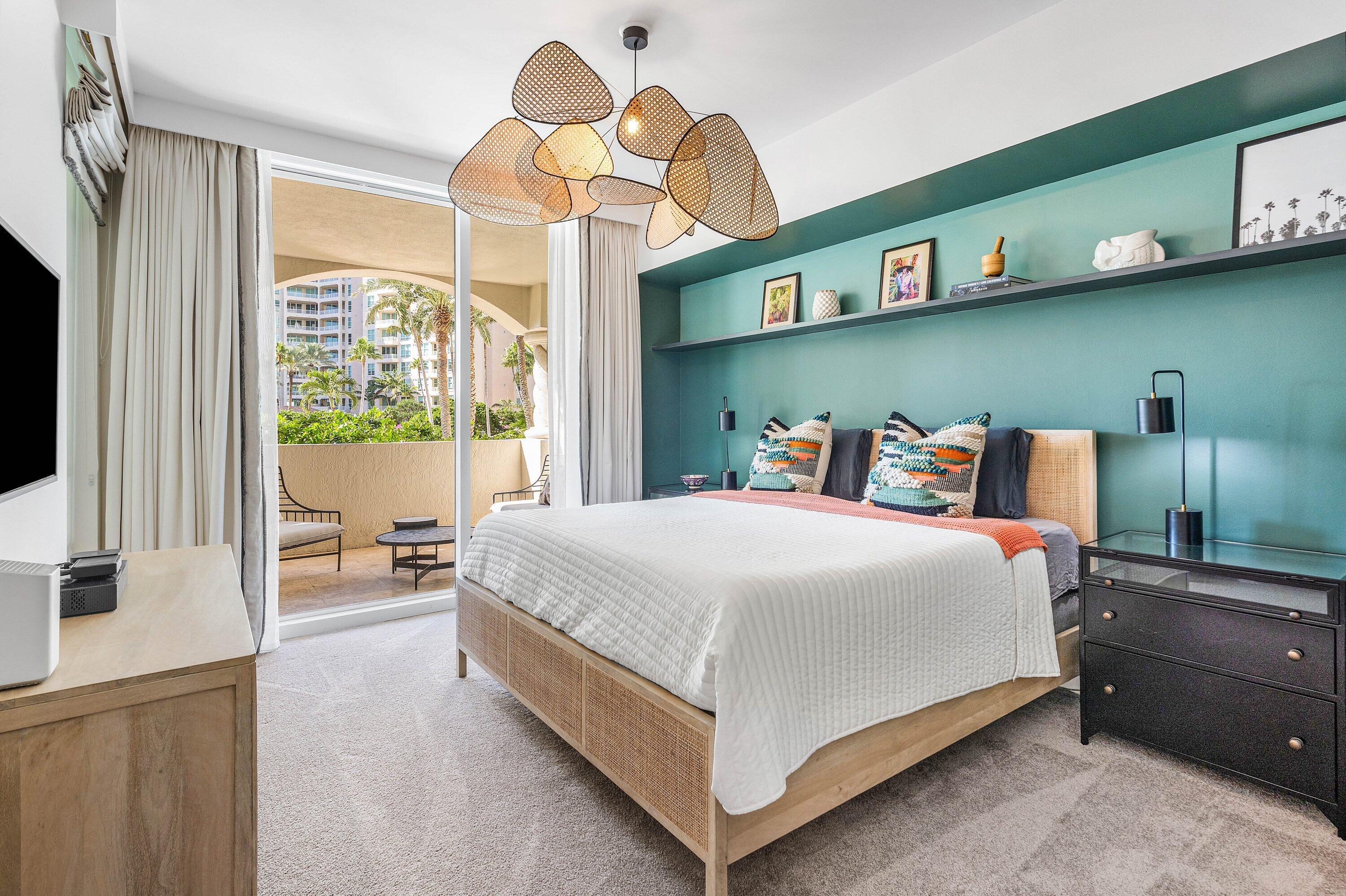 3700 South Ocean Boulevard, Unit 202 Highland Beach, FL 33487 - Photo 23 of 75 a bed room with a bed and a window