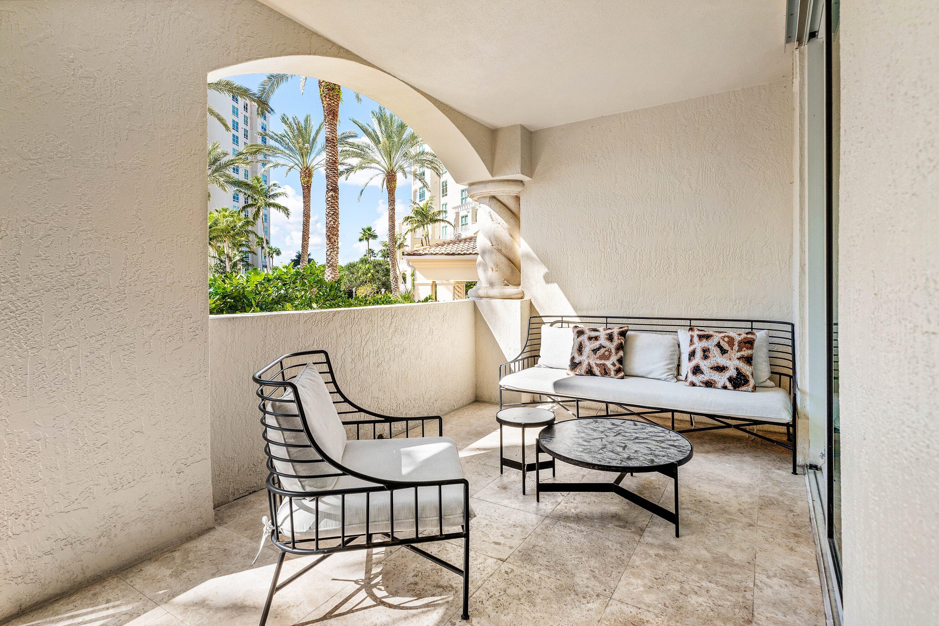 3700 South Ocean Boulevard, Unit 202 Highland Beach, FL 33487 - Photo 39 of 75 a view of a chairs and table in a room