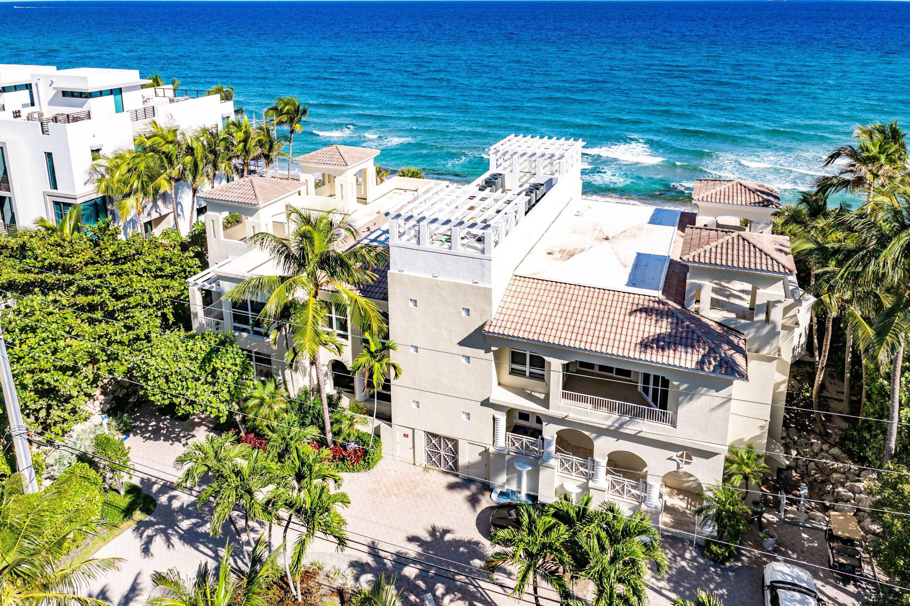 3700 South Ocean Boulevard, Unit 202 Highland Beach, FL 33487 - Photo 49 of 75 view of a house with a yard