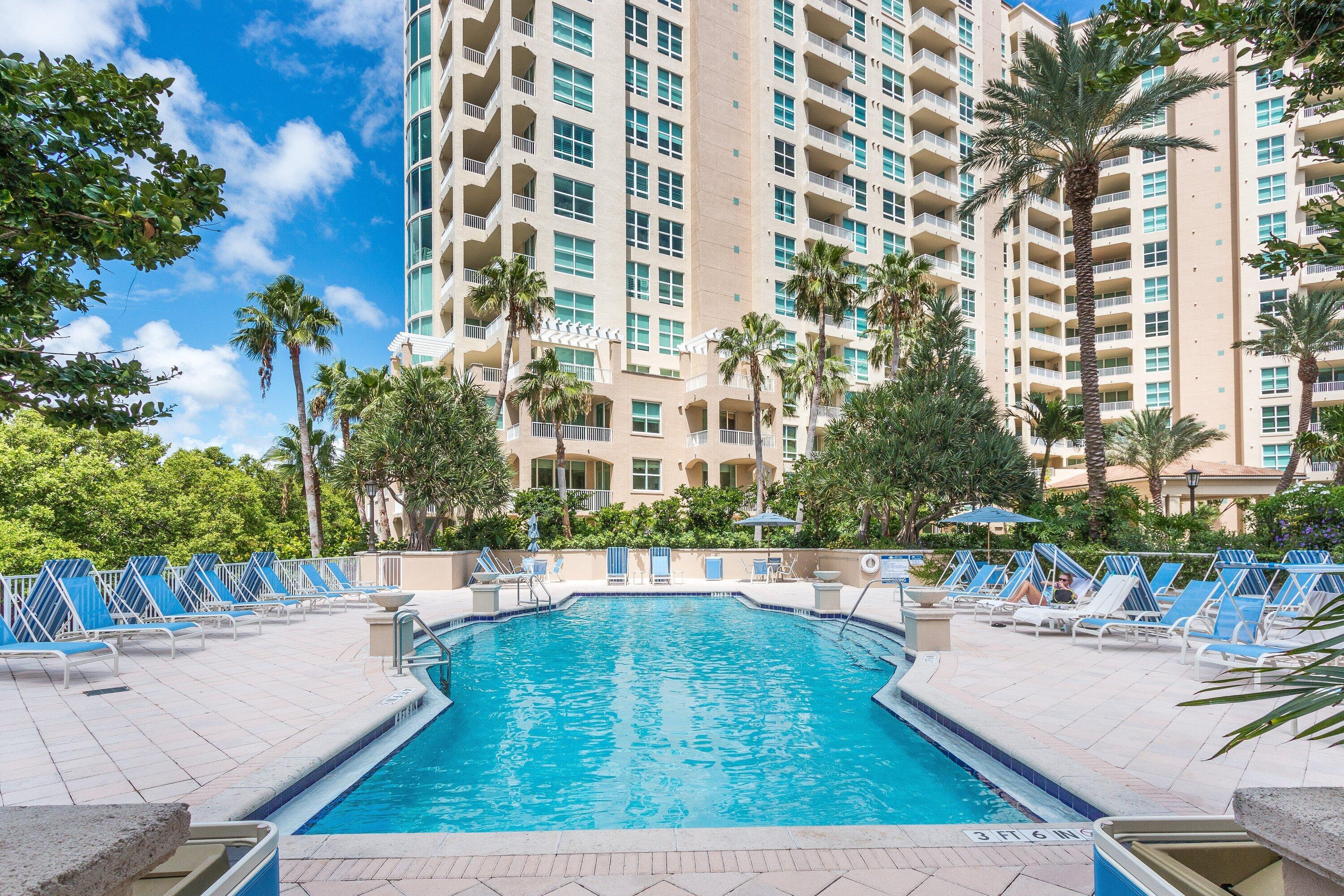 3700 South Ocean Boulevard, Unit 202 Highland Beach, FL 33487 - Photo 70 of 75 a view of a swimming pool with outdoor seating