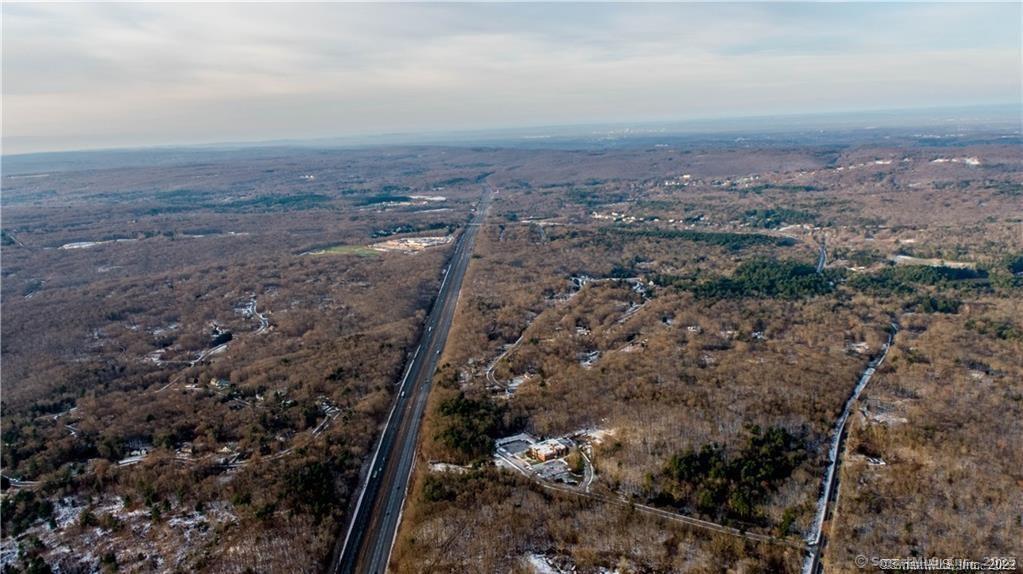 Tolland Stage Road Tolland, CT 06084 - Photo 4 of 11 an aerial view of house with yard and mountain view in back