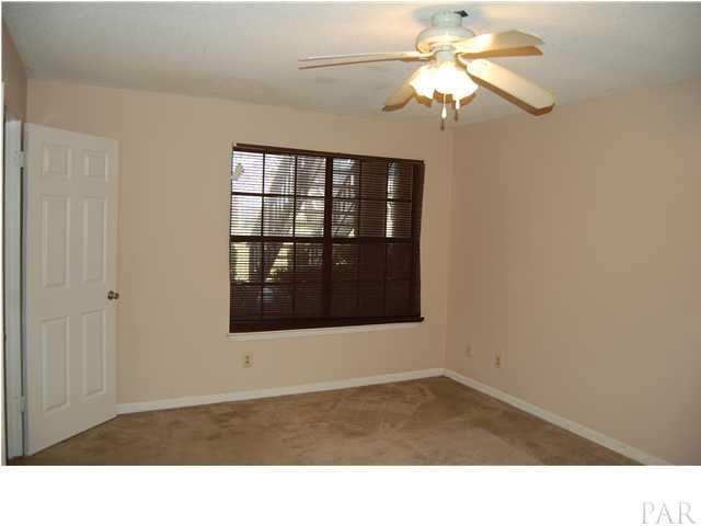 7150 Plantation Road, Unit 413 Pensacola, FL 32504 - Photo 10 of 21 Master bedroom is great size and comfortable with window light, but private feel