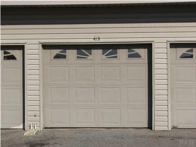7150 Plantation Road, Unit 413 Pensacola, FL 32504 - Photo 16 of 21 Single car garage is terrific, and has extra room for storage