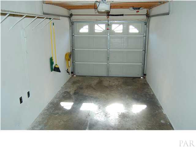 7150 Plantation Road, Unit 413 Pensacola, FL 32504 - Photo 17 of 21 High ceiling and depth are assets for the owner of this condo