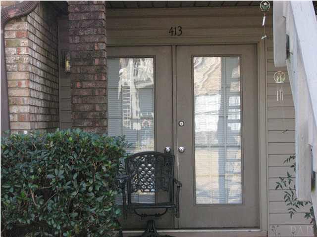 7150 Plantation Road, Unit 413 Pensacola, FL 32504 - Photo 4 of 21 Front door and patio.