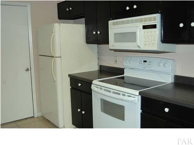 7150 Plantation Road, Unit 413 Pensacola, FL 32504 - Photo 9 of 21 Good cook space and storage, additional pantry space is convenient