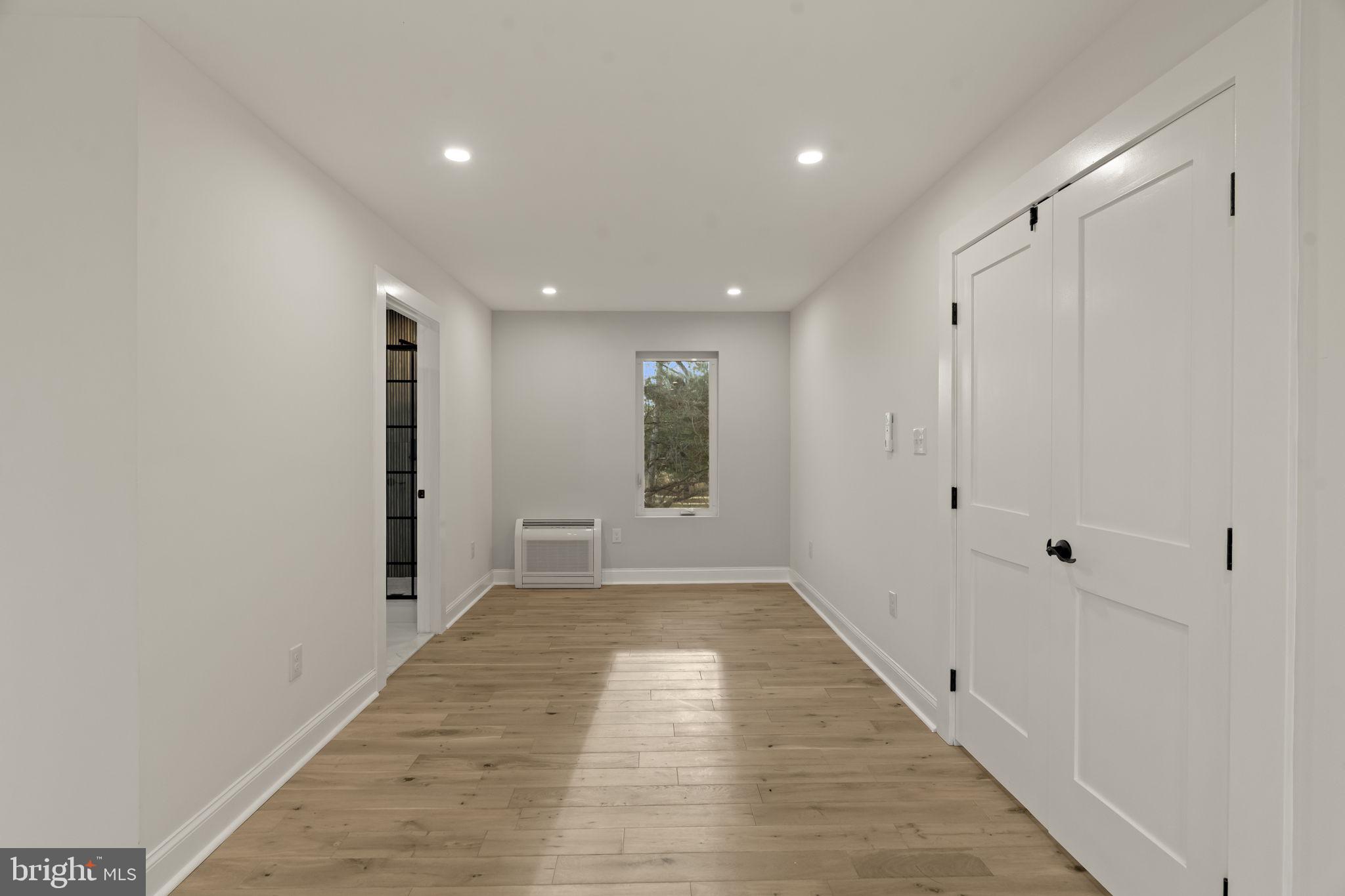 300 Witmer Road Horsham, PA 19044 - Photo 21 of 37 a view of a hallway with wooden floor