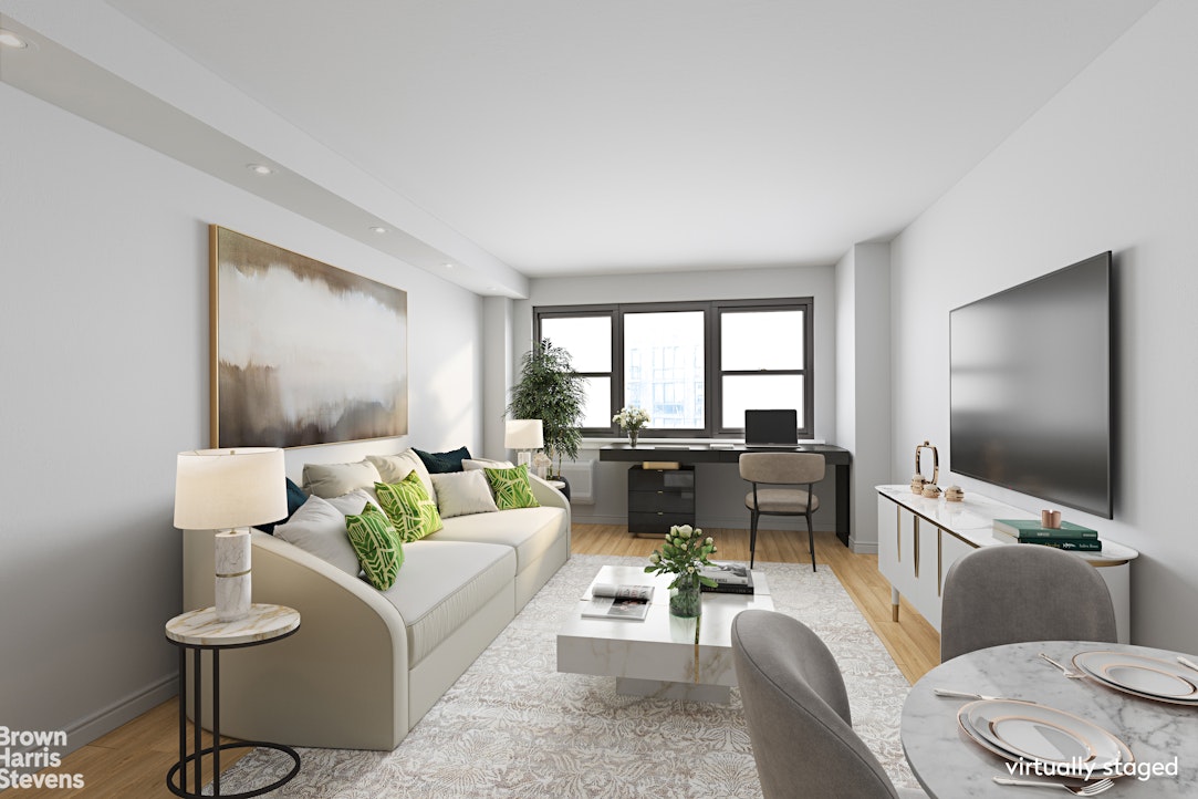357 East 57th Street, Unit 11E Manhattan, NY 10022 - Photo 1 of 7 a living room with furniture and a flat screen tv